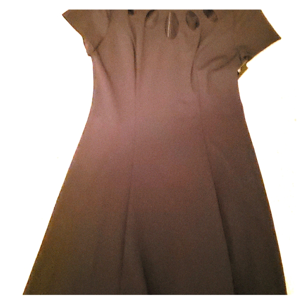 A Black Dress With Cutout Detail